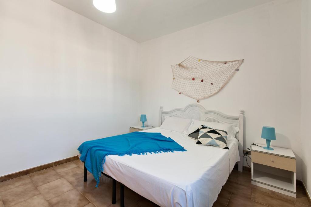 Posteľ alebo postele v izbe v ubytovaní Casa Franci Torre dell'Orso