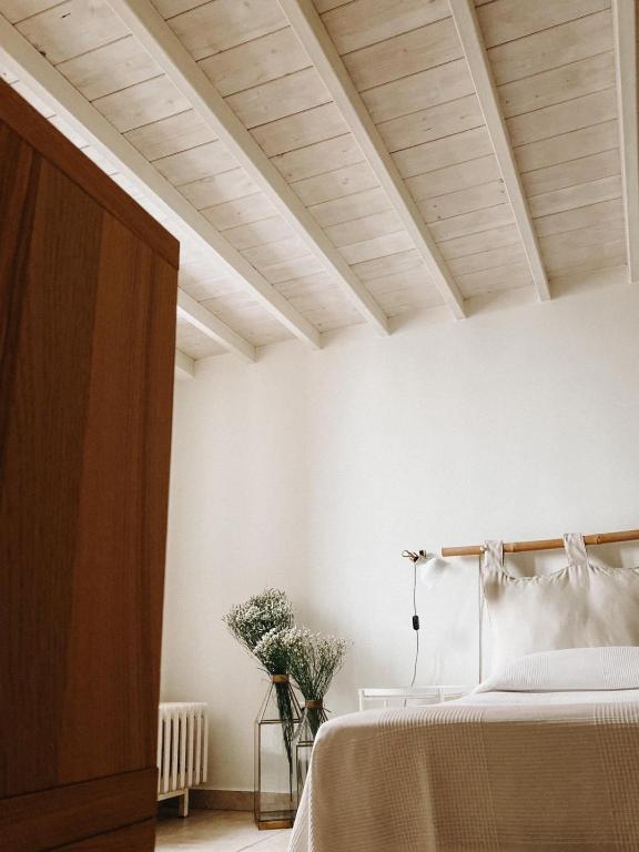 Postel nebo postele na pokoji v ubytování B&B MARNUDD