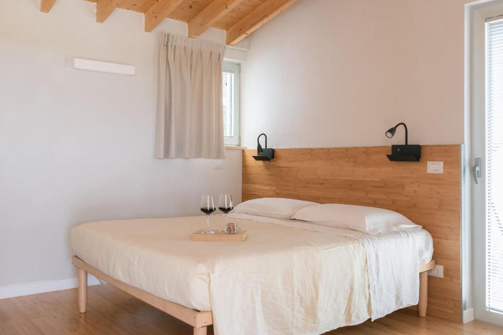Postel nebo postele na pokoji v ubytování OrtoPì Country Canapa House
