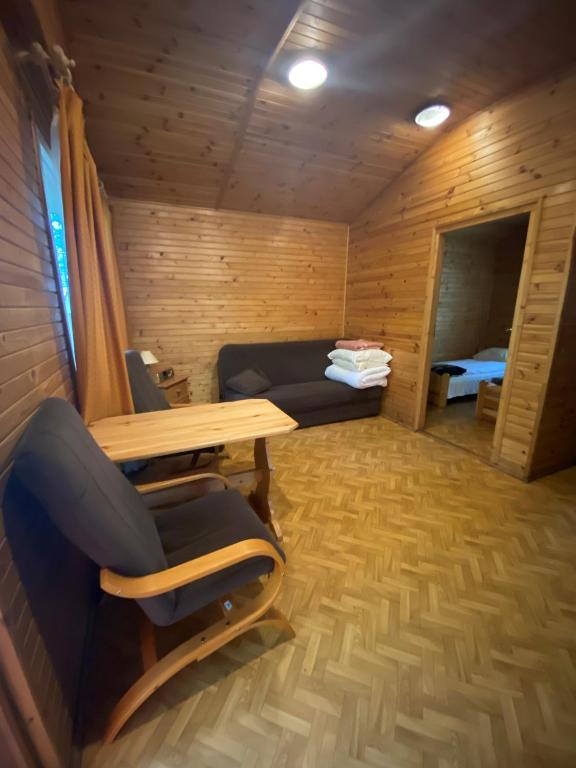 Posezení v ubytování Ośrodek Wrzosowa Góra - domki