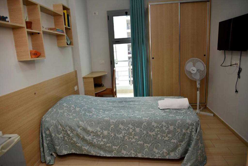 Postel nebo postele na pokoji v ubytování Arianiti Guesthouse