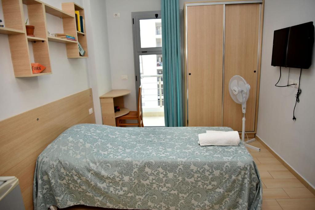 Postel nebo postele na pokoji v ubytování Arianiti Guesthouse