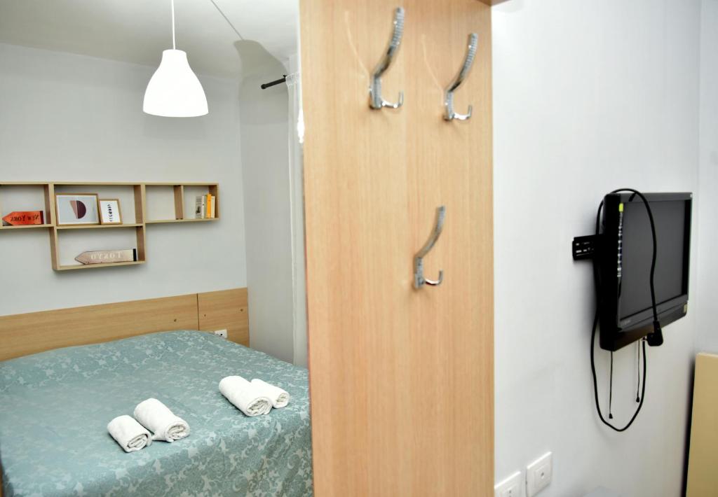 Postel nebo postele na pokoji v ubytování Arianiti Guesthouse