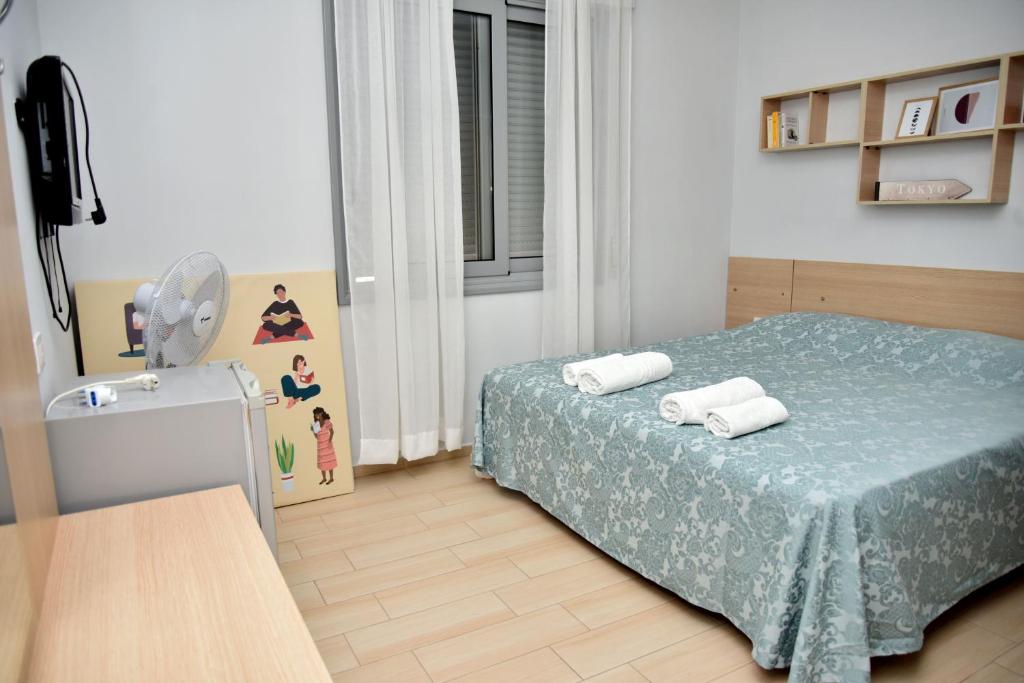 Postel nebo postele na pokoji v ubytování Arianiti Guesthouse