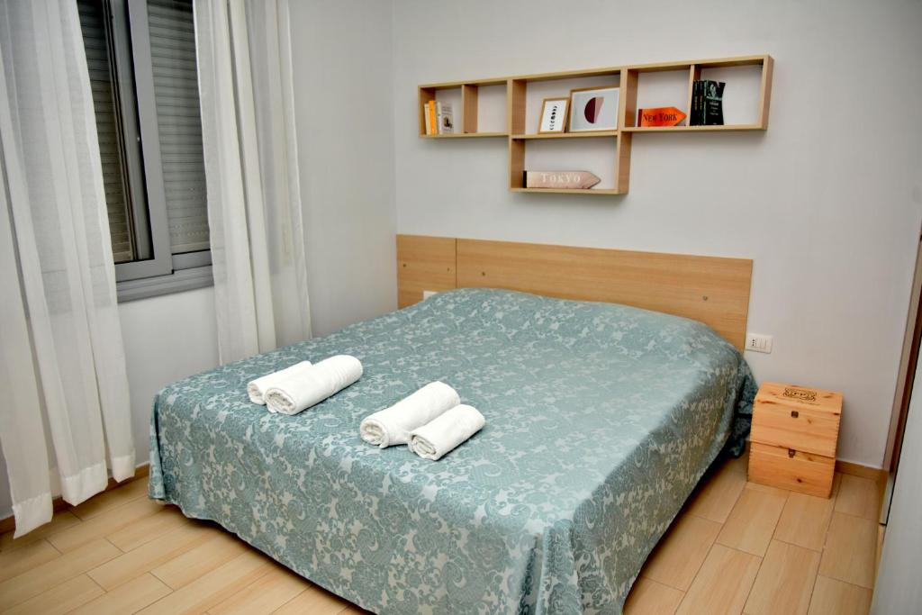 Postel nebo postele na pokoji v ubytování Arianiti Guesthouse