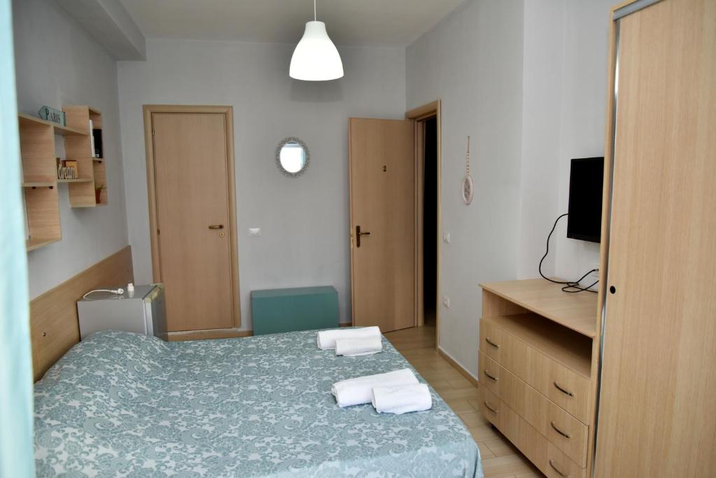 Postel nebo postele na pokoji v ubytování Arianiti Guesthouse