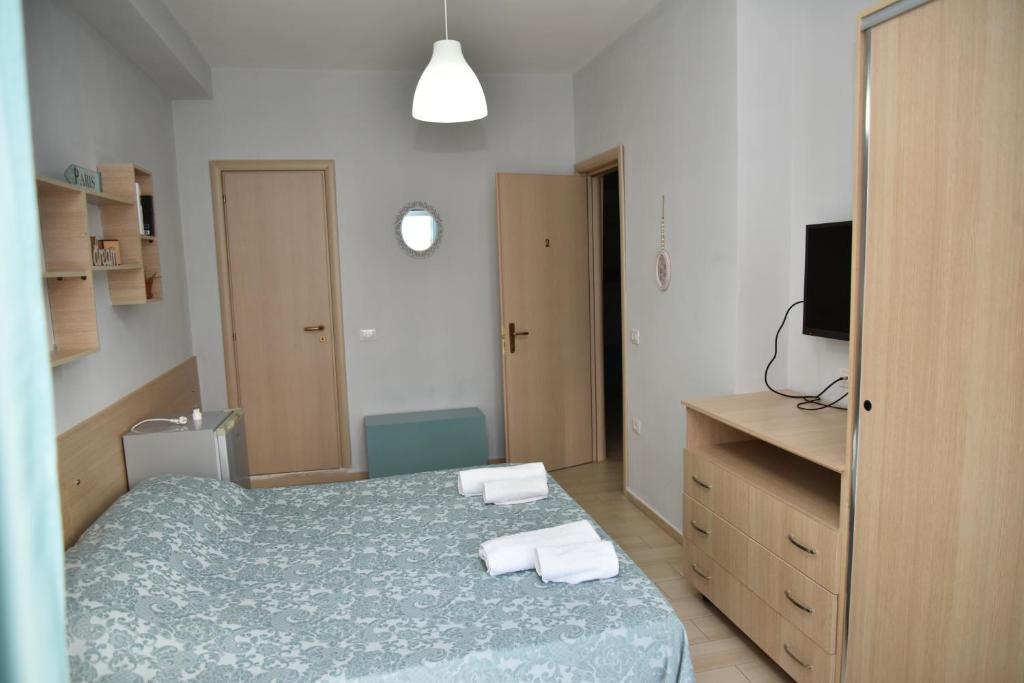 Postel nebo postele na pokoji v ubytování Arianiti Guesthouse