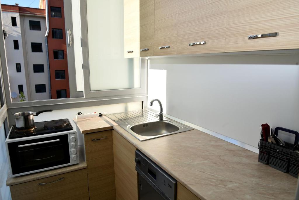 Kuchyň nebo kuchyňský kout v ubytování Arianiti Guesthouse