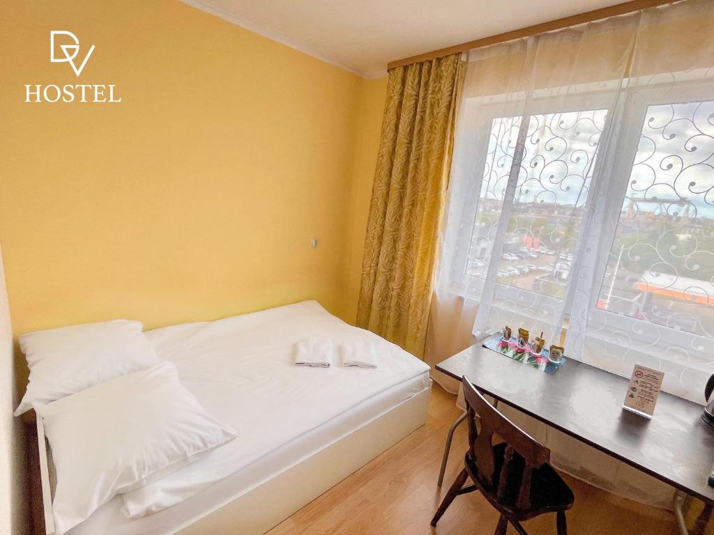Posteľ alebo postele v izbe v ubytovaní Hostel DV Morski - z prywatnymi łazienkami