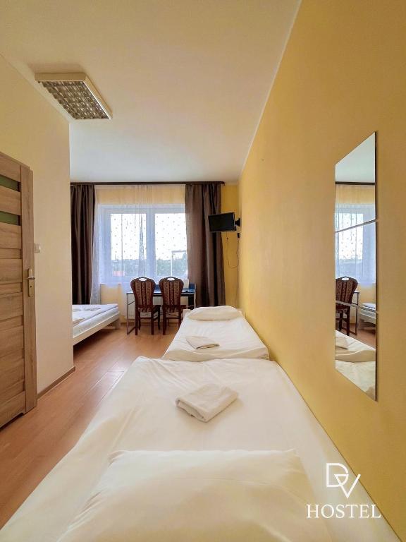 Posteľ alebo postele v izbe v ubytovaní Hostel DV Morski - z prywatnymi łazienkami