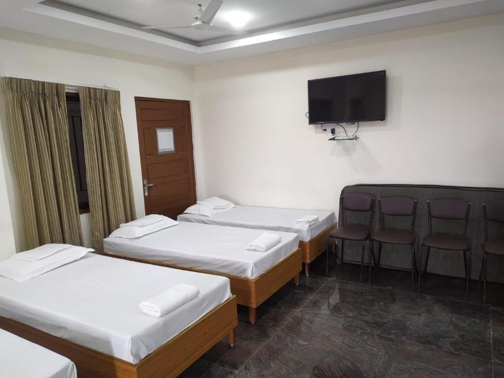 Postel nebo postele na pokoji v ubytování BAY INN