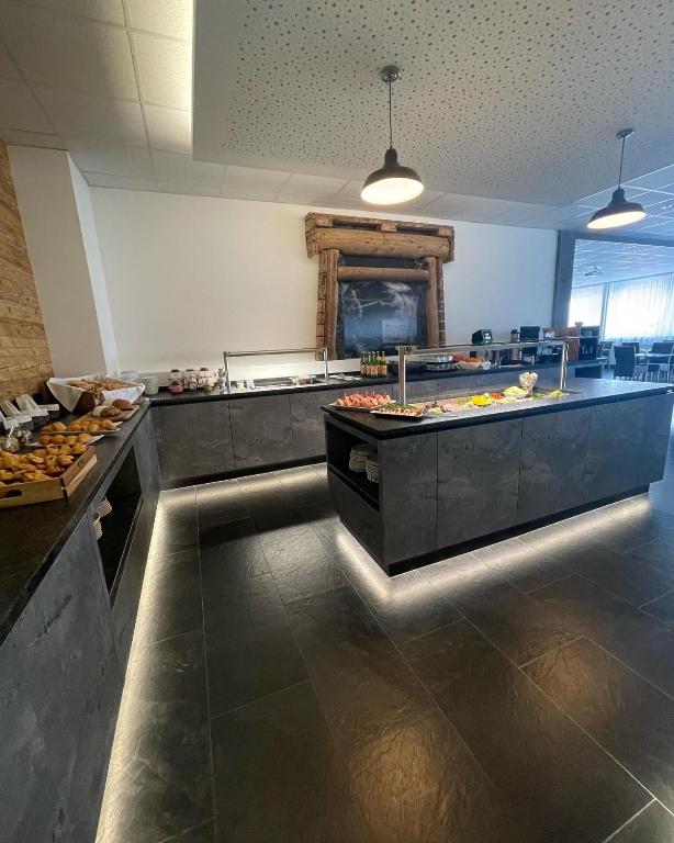 Kuchyň nebo kuchyňský kout v ubytování Hotel Fohnsdorf