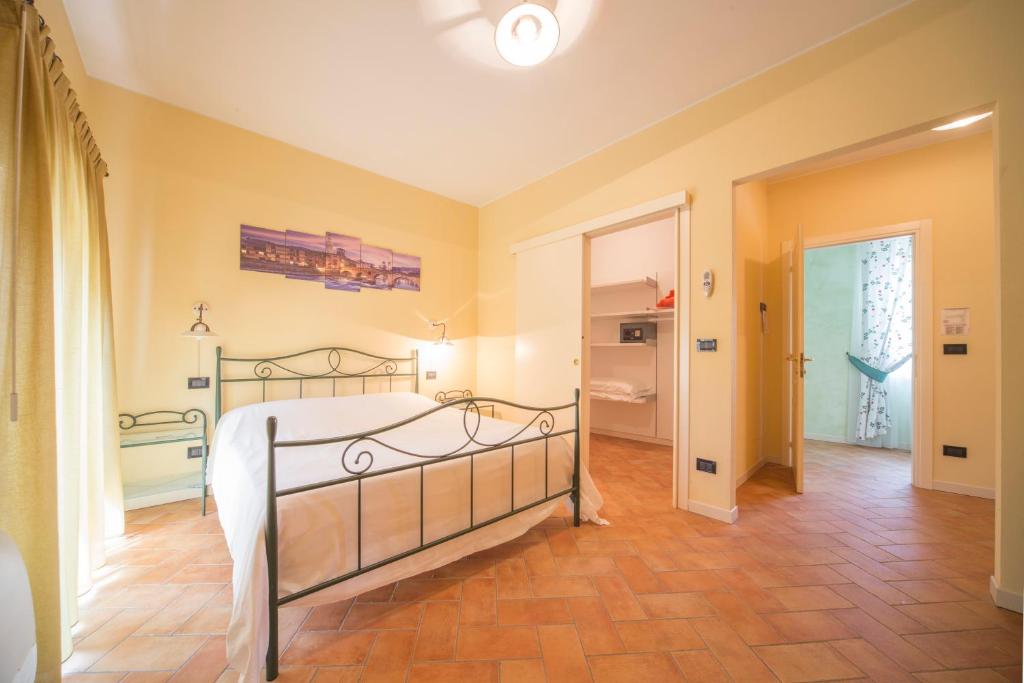Postel nebo postele na pokoji v ubytování Hotel Antichi Cortili