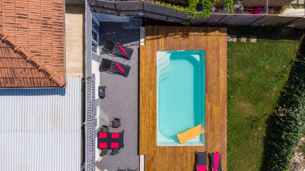 Bazén v ubytování Apartman A2 s vlastitim bazenom nebo v jeho okolí