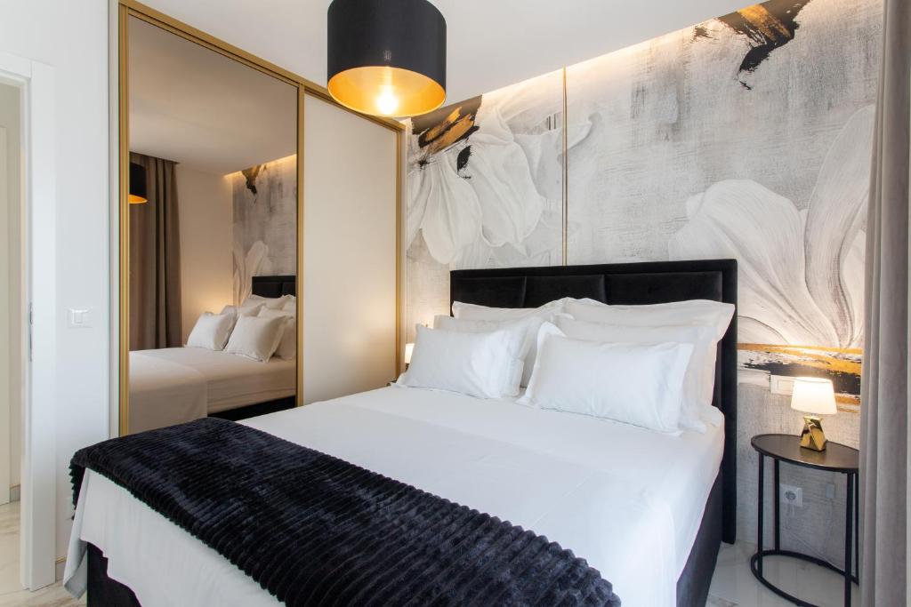 מיטה או מיטות בחדר ב-Apartments Taratta