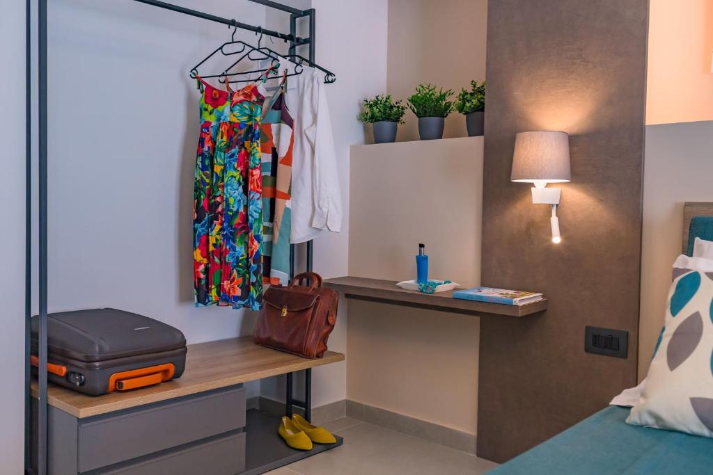 Postel nebo postele na pokoji v ubytování Macramè Fazello Rooms