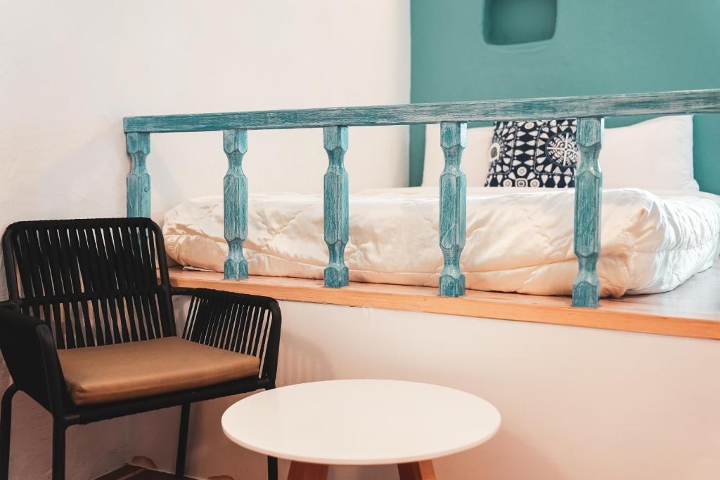 Rúm í herbergi á Bethlehem B&B Kenting