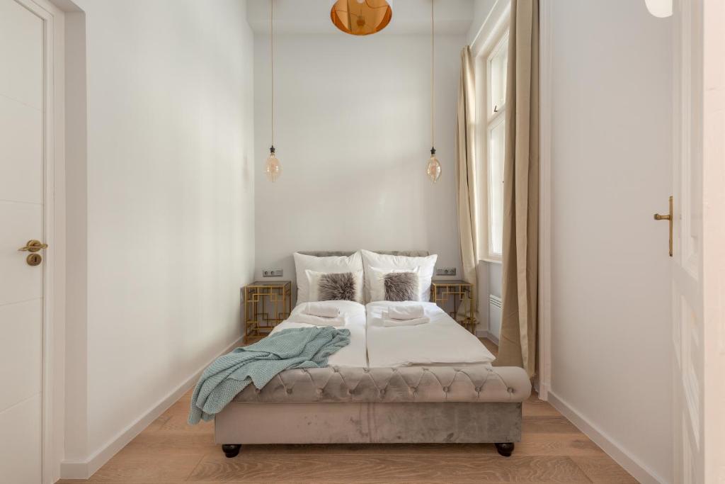 Posteľ alebo postele v izbe v ubytovaní Space and Elegance in The Heart of Budapest
