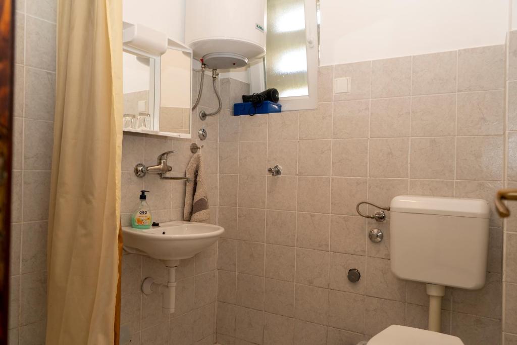 Koupelna v ubytování Apartman Čurčić