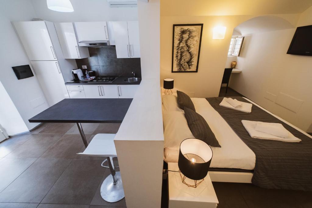 Telewizja i/lub zestaw kina domowego w obiekcie Villino Erminia - Seaside Art b&b