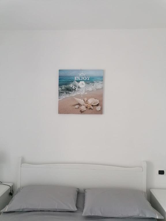 Postel nebo postele na pokoji v ubytování L'Alba