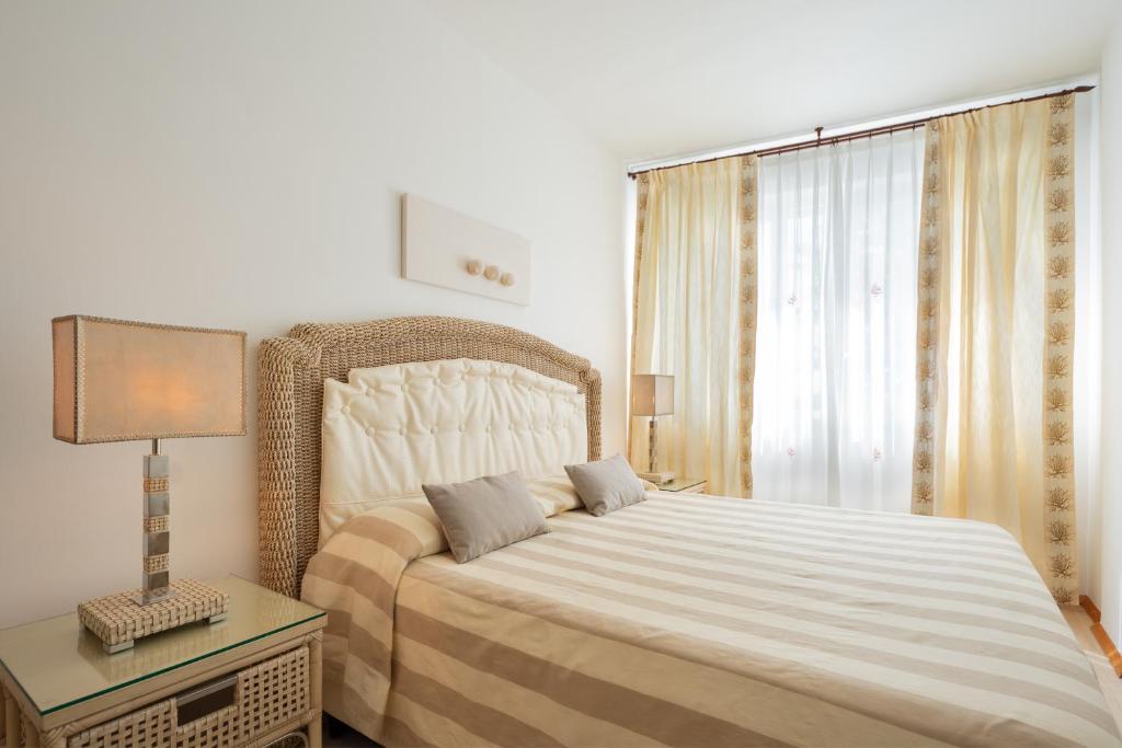 Postel nebo postele na pokoji v ubytování Relais Valle Dell'Idro
