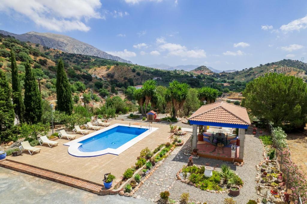 an aerial view of a resort with a swimming pool at Alojamiento Rural el Viso in El Chorro