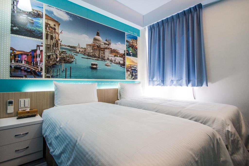 Postel nebo postele na pokoji v ubytování Morwing Hotel - Ocean