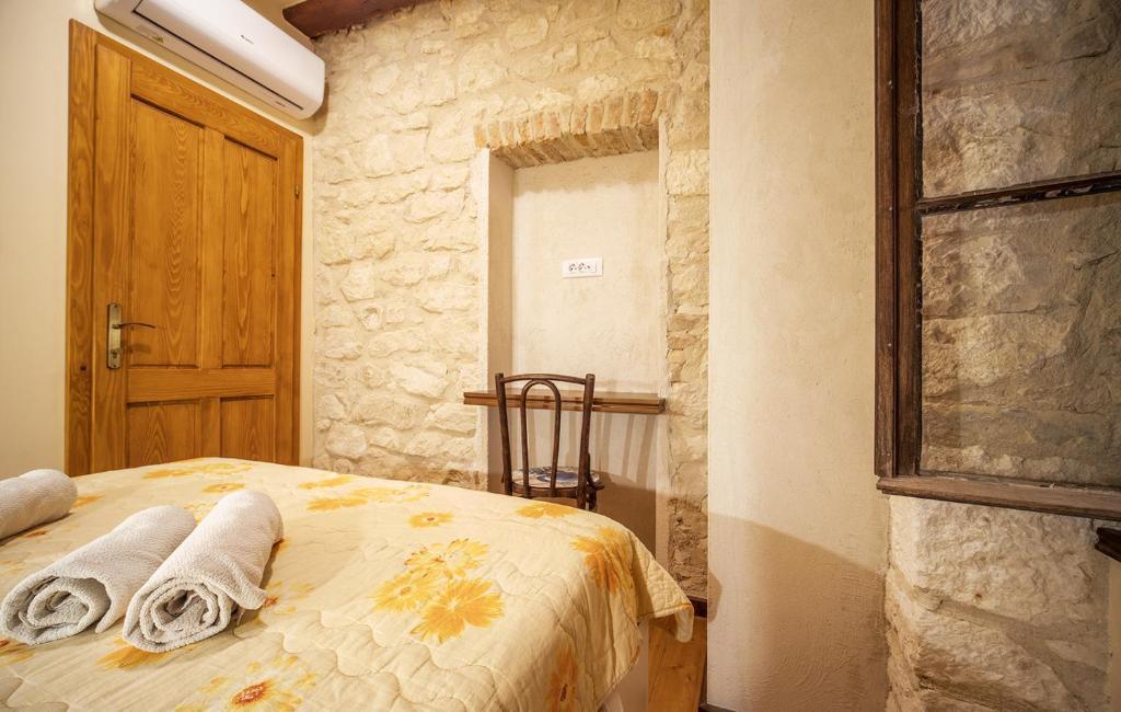 Postel nebo postele na pokoji v ubytování Villa on Biševo - transfer and car included, 5 min to the sea