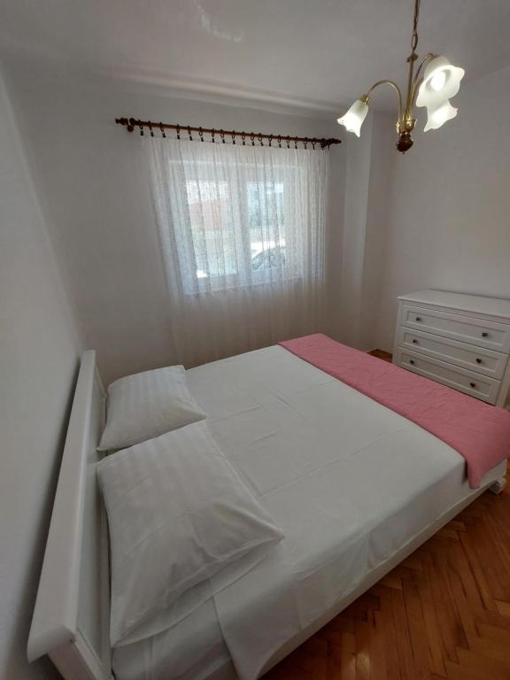 Postel nebo postele na pokoji v ubytování white sensation