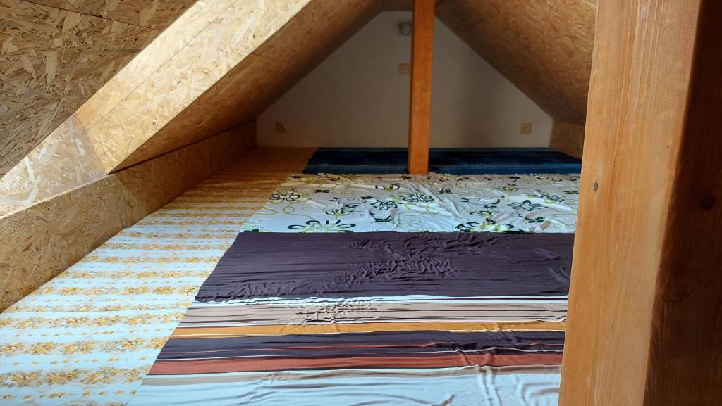 Postel nebo postele na pokoji v ubytování Kubátovna