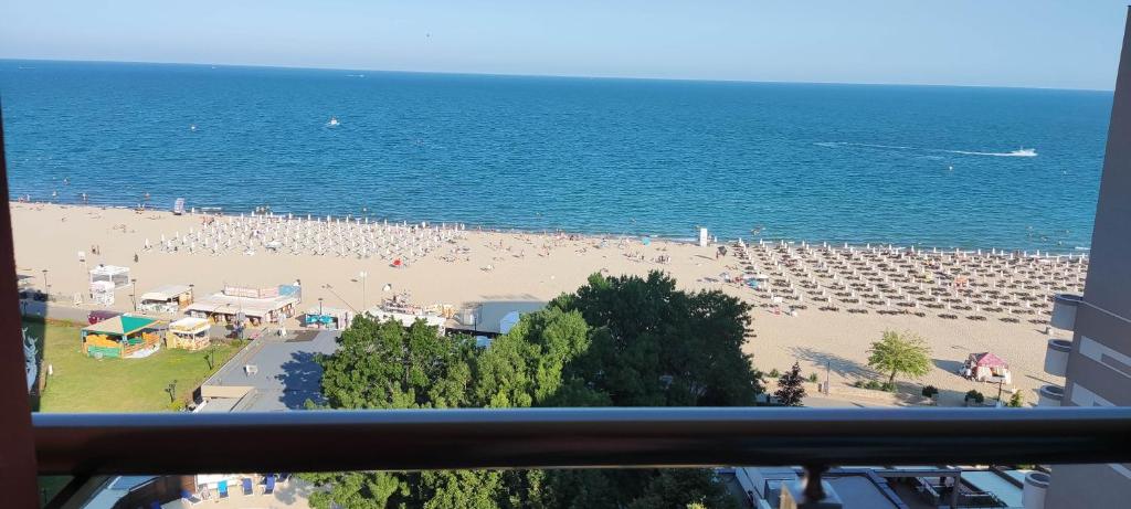 a view of a beach with a lot of people at Hotel Shipka Beach - Free parking in Sunny Beach