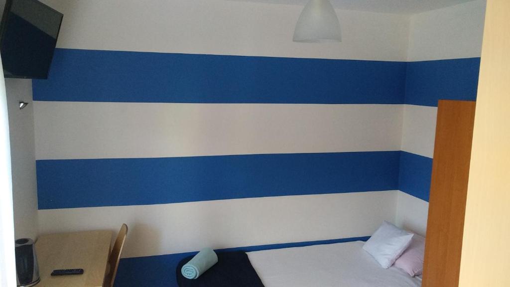 Postel nebo postele na pokoji v ubytování SILVER ROWY