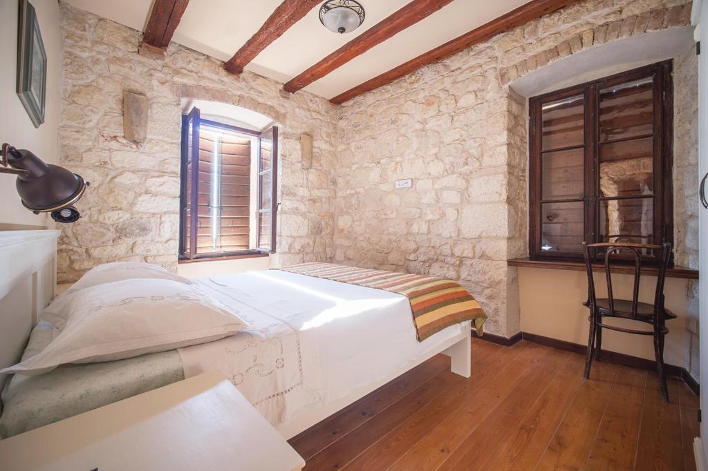 Postel nebo postele na pokoji v ubytování Villa on Biševo - transfer and car included, 5 min to the sea