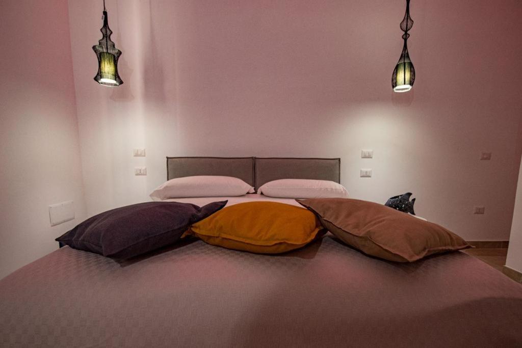 Postel nebo postele na pokoji v ubytování Villa Barone
