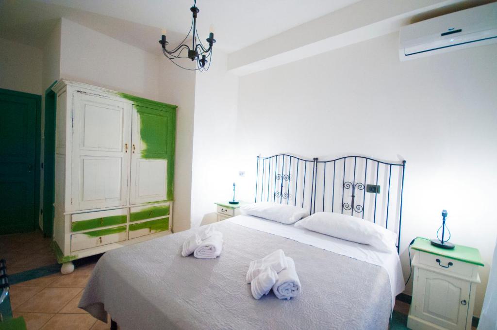 Postel nebo postele na pokoji v ubytování Albergo La Fontanella