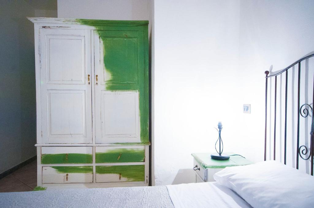 Postel nebo postele na pokoji v ubytování Albergo La Fontanella
