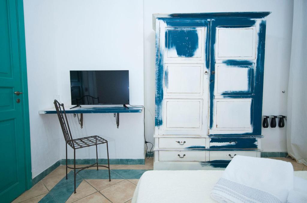 TV a/nebo společenská místnost v ubytování Albergo La Fontanella