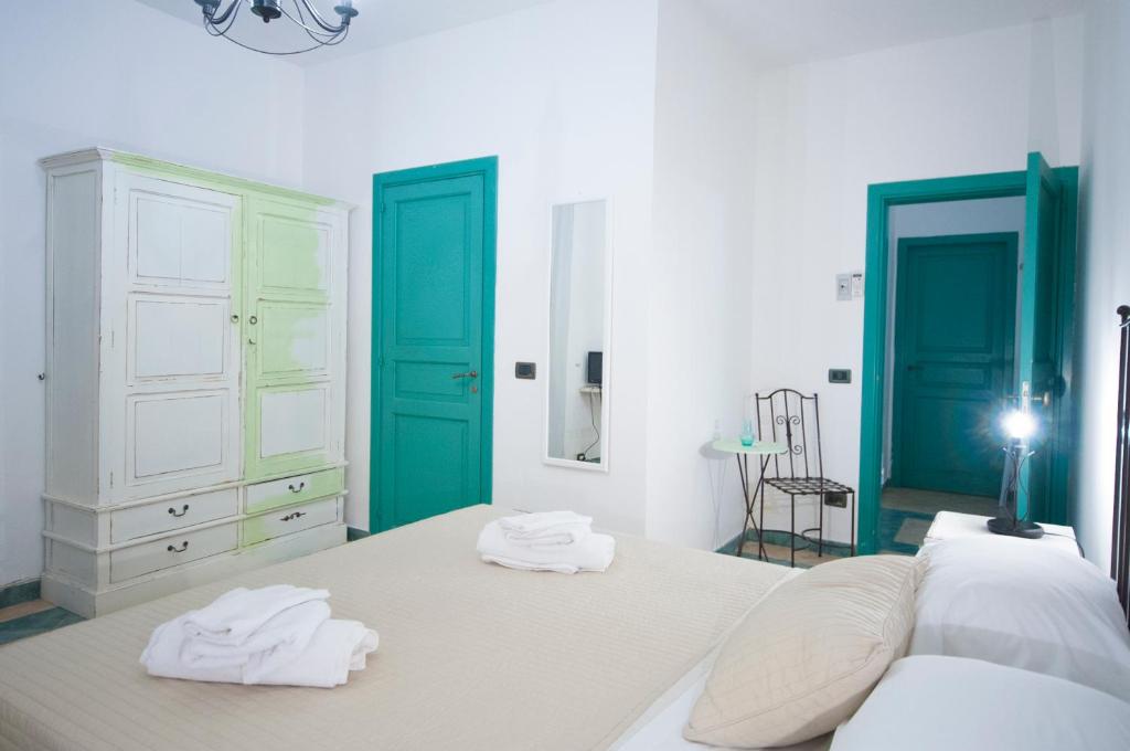 Postel nebo postele na pokoji v ubytování Albergo La Fontanella