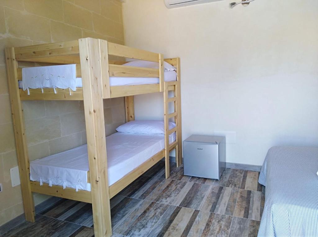 Postel nebo postele na pokoji v ubytování Oliví