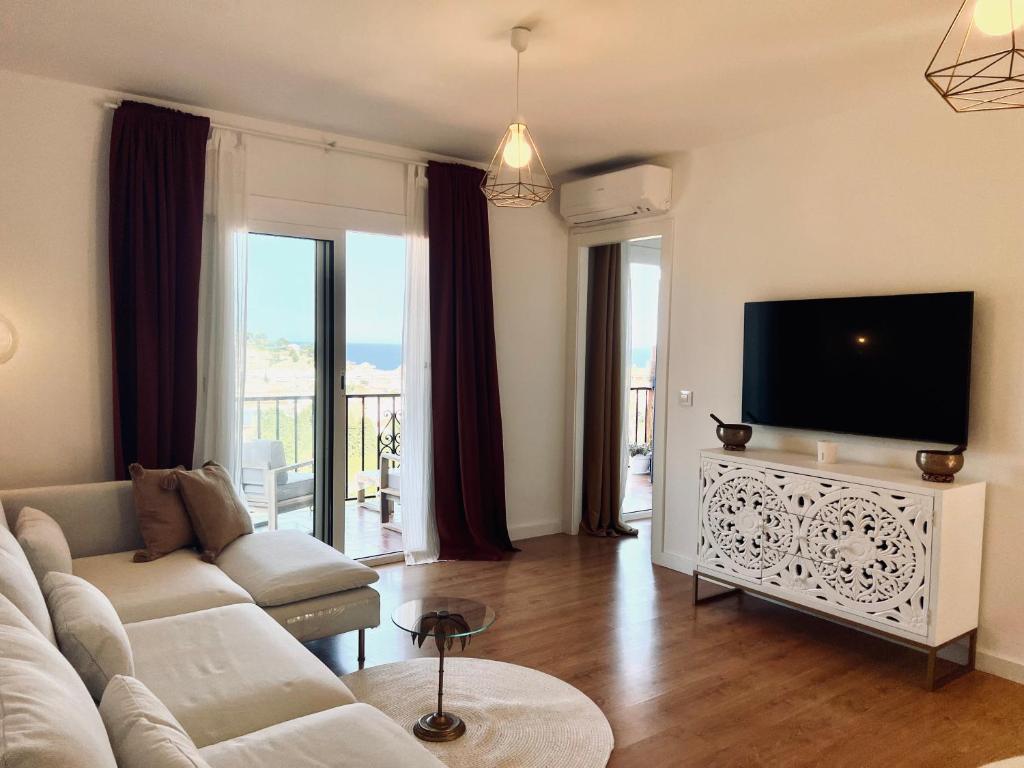 TV a/nebo společenská místnost v ubytování ZEN Apartment sea views