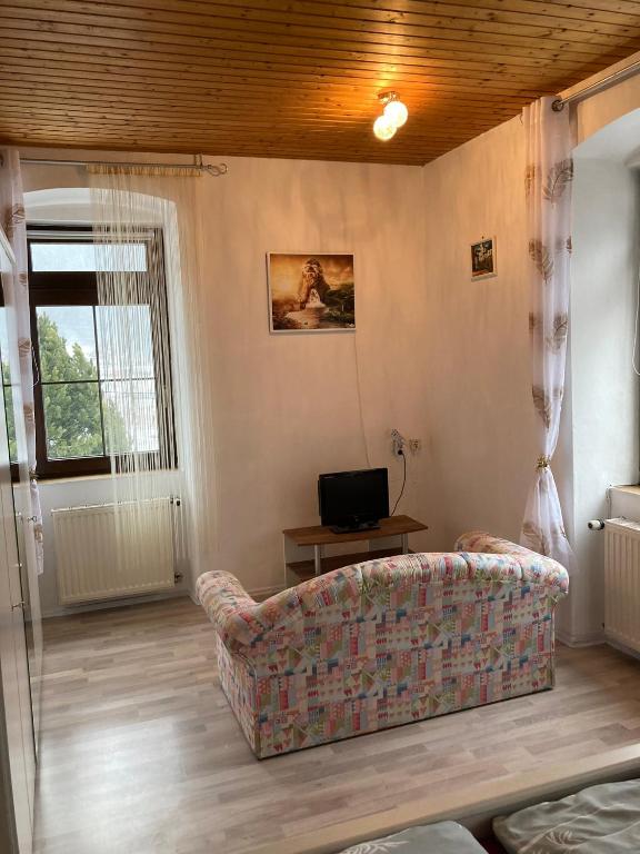 TV a/nebo společenská místnost v ubytování Haus Obernig