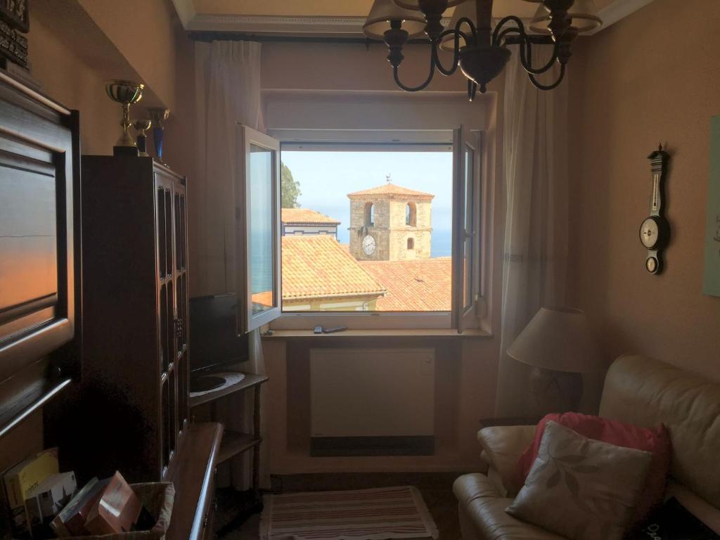 Posezení v ubytování La casina del Reloj con vistas al mar