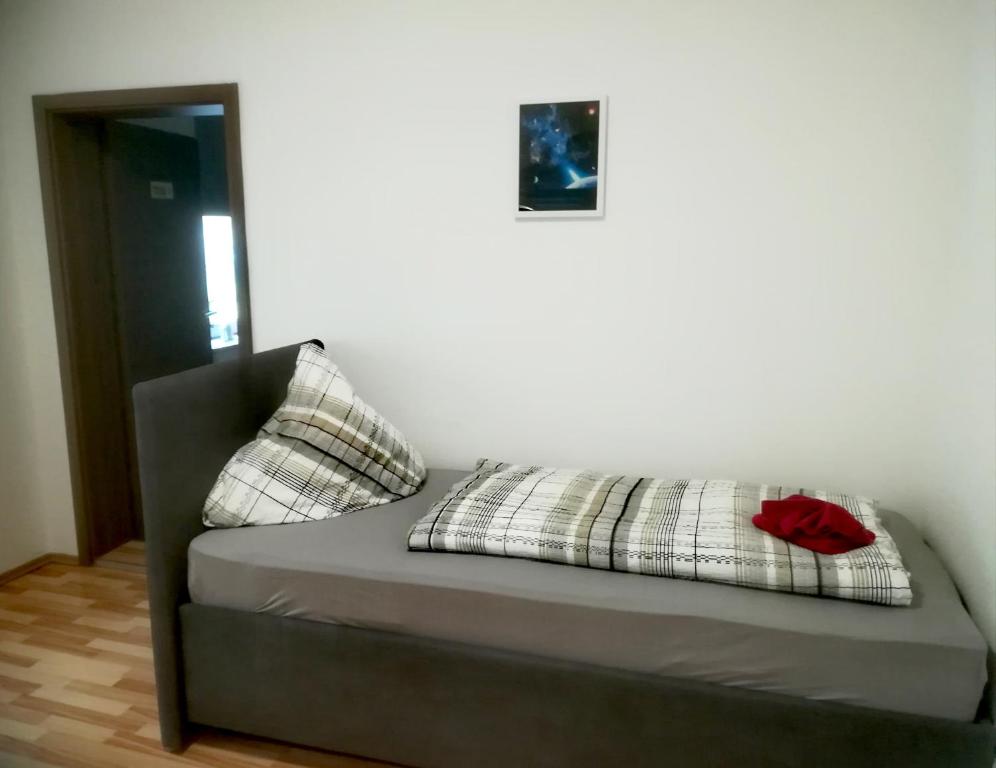 Cama o camas de una habitación en Ferienwohnung Axel - nahe Chemnitz