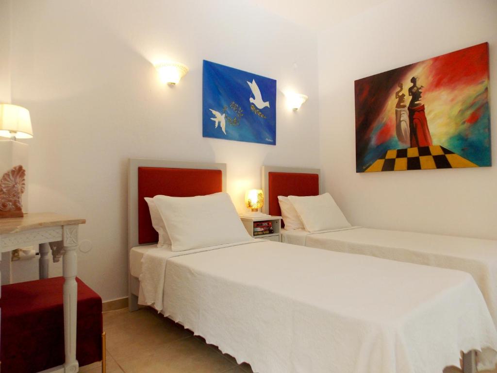 Postel nebo postele na pokoji v ubytování Skiathos Driades