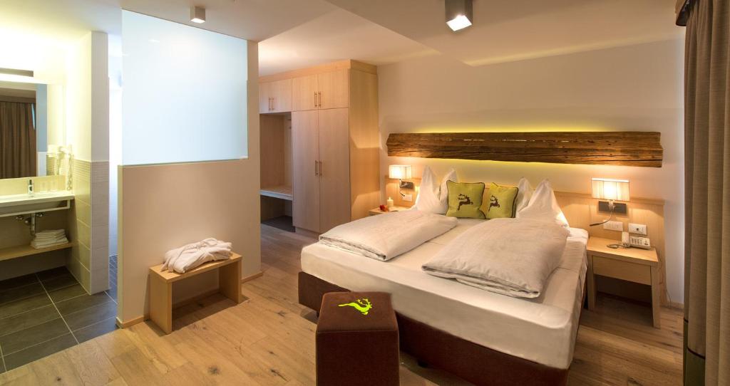 Postel nebo postele na pokoji v ubytování Hotel Regglbergerhof
