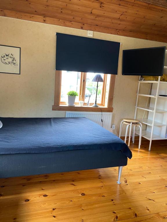 Postel nebo postele na pokoji v ubytování Lillstugan Lyckan