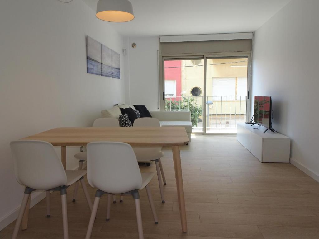 Televízia a/alebo spoločenská miestnosť v ubytovaní Precioso apartamento familiar con aparcamiento