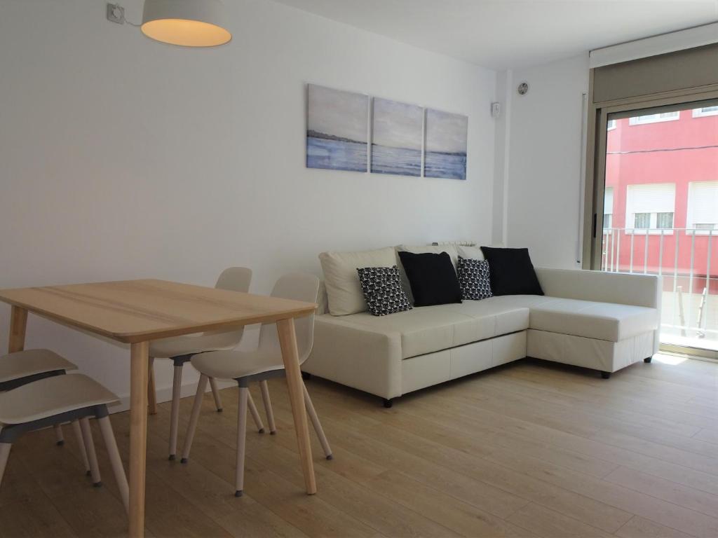 Posedenie v ubytovaní Precioso apartamento familiar con aparcamiento