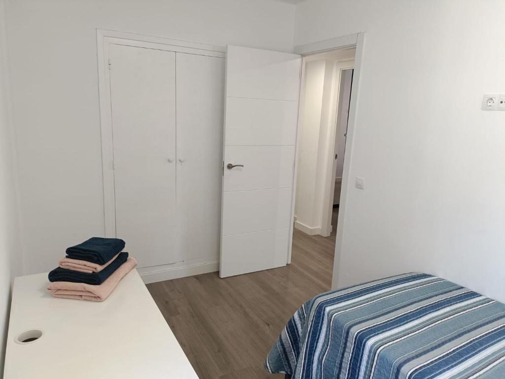 Postel nebo postele na pokoji v ubytování Apartamento El Torreón, con opción a parking